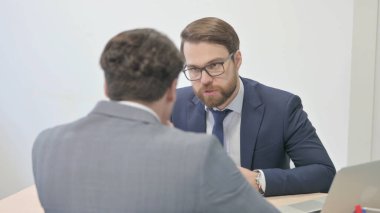 Angry Businessman Fighting with in Argument