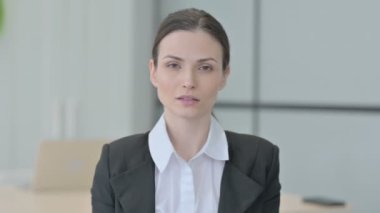 Portrait of Disliking Businesswoman in Denial