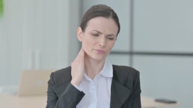 Tired Businesswoman Massaging Her Neck, Stretching Body