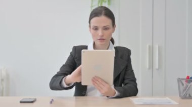 Young Businesswoman Cheering Win on Digital Tablet