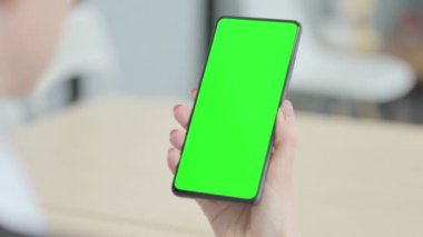 Close Up of Hand Using Green Screen Smartphone