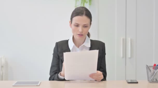 Young Businesswoman Reading Documents Office Paperwork — Wideo stockowe