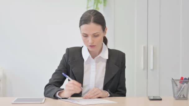 Young Businesswoman Working Documents Calculating Business Data — Stock video