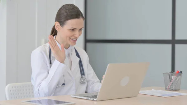 Young Doctor Doing Online Video Chat Clinic — Stockfoto