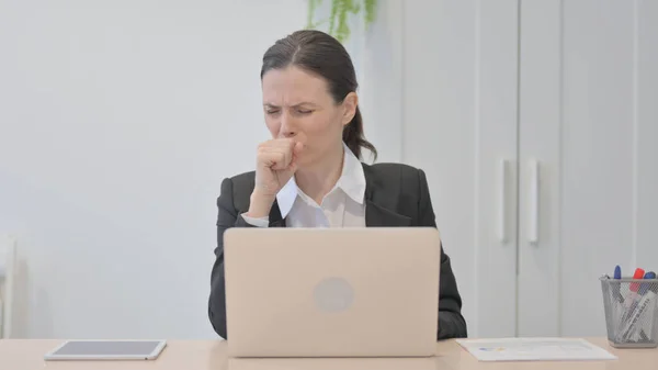 Young Businesswoman Coughing While Working Laptop — Photo