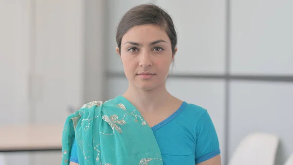 Portrait of Serious Indian Woman in Sari