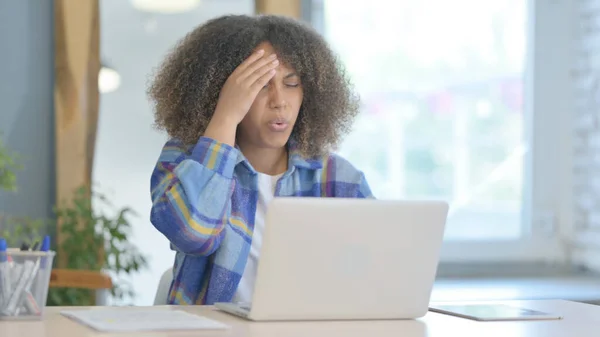 stock image Young African Woman with Headache Working on Laptop