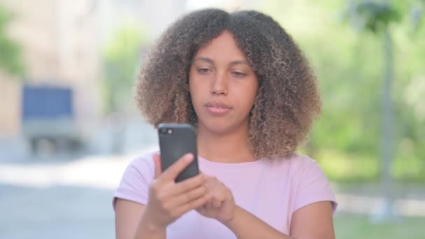 Outdoor Portrait African American Woman Celebrating Success Smartphone — Stock Video