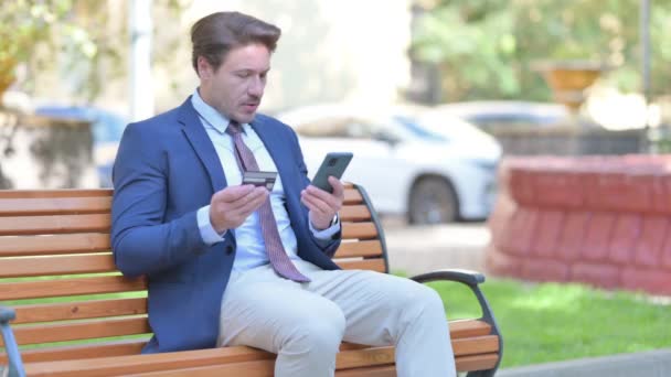 Businessman Doing Online Shopping Phone While Sitting Outdoor — Stock Video