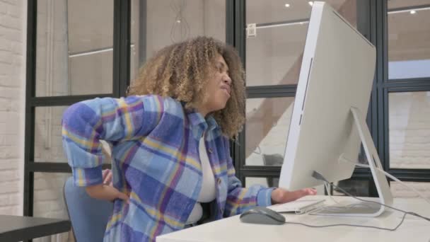African Woman Having Back Pain While Working Desktop — Stock Video