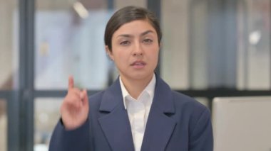 Portrait of Indian Businesswoman Pointing at Camera