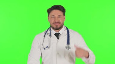 Yeşil zemin üzerinde başparmakları olan doktorun portresi