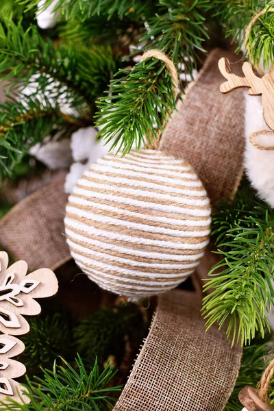 Natural Christmas tree ornament bauble made from beige and white jute rope