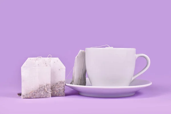Tea Cup Herbal Tea Bags Violet Background — Stockfoto