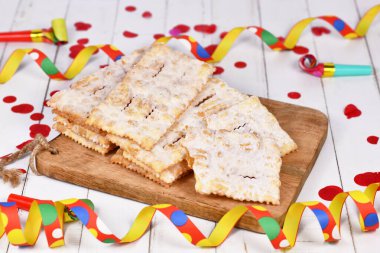 Fried Italian dessert snack for carnival season called 'Galani', ' Chiacchiere' or 'Crostoli' depending on region. Also known as Angel Wings pastry