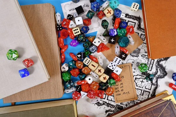 Colorful tabletop role playing RPG game dices and rule books