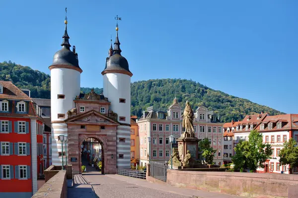 stock image Germany, Heidelberg - June 28th 2024:  Gate to 'Karl Theodor Bridge', also known as the Old Bridge, called `Alte Bruecke in German, an arch bridge in city Heidelberg