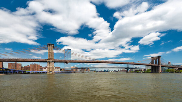 Brooklyn Bridge Crosses the East River in New York City
