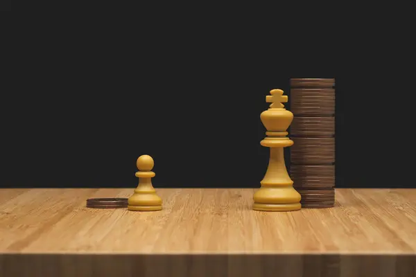 Zenginlik ve yoksulluk kavramı. Zengin ve fakir arasındaki eşitsizlik. Parası olan gücü elinde tutar. Bir papazın önünde bir çift bozuk paralı satranç piyonu ve bir sürü bozuk para. Kavramsal resim.