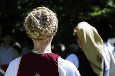 Woman wearing one of the traditional folk costume from Uzide, Serbia