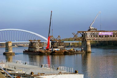 Disassembly of the Old Bridge in Bratislava, Slovakia. clipart