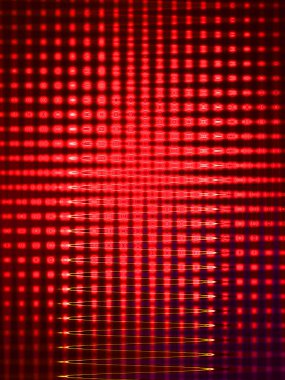 A 3D rendering of an abstract bright red wavy psychedelic background