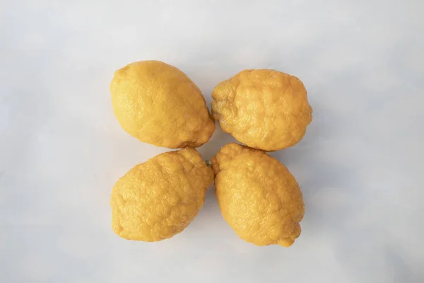 lemons on a white background, top view, close-up