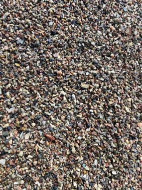 Renkli ıslak çakıl taşları ve çakıl taşları arka plan için iyidir