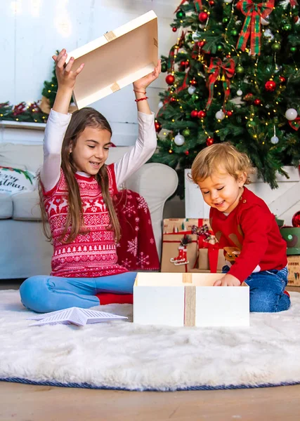 Children Open Christmas Gifts Tree Selective Focus Kid — Stock Photo, Image