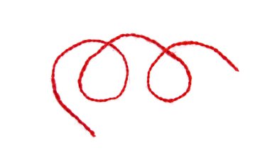 Red thread isolate on white background. Selective focus. Old.