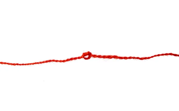 stock image Red thread isolate on white background. Selective focus. Old.