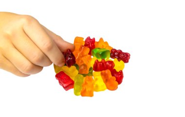 Jöle vitaminleri oyuncak ayılar beyaz arka planda izole edilir. Seçici odaklanma. Çocuk.