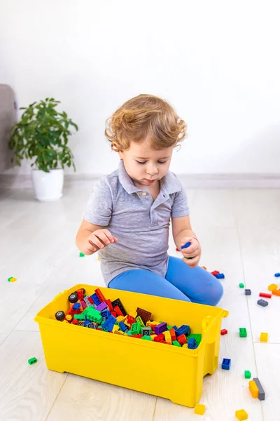 Child Plays Constructor Selective Focus Kid — Stock Photo, Image