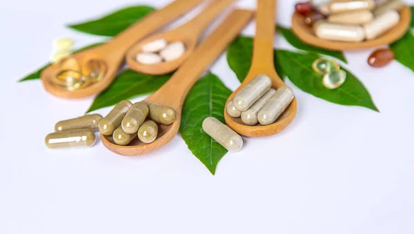 Capsules Herb Supplements Green Leaves Background Selective Focus Green — Stock Photo, Image