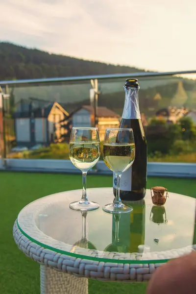 Glasses of wine against the background of mountains. Selective focus. Nature.