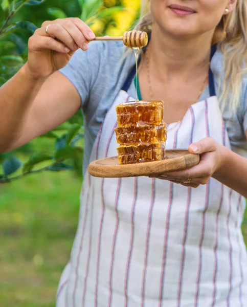 Woman Holds Honey Garden Selective Focus Nature — Stock Photo, Image