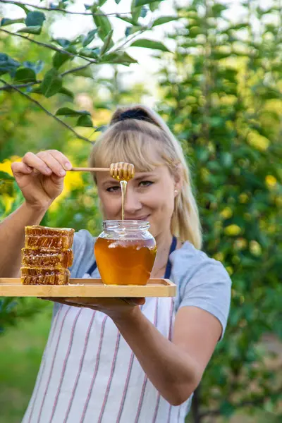 Woman Holds Honey Garden Selective Focus Nature — Stock Photo, Image