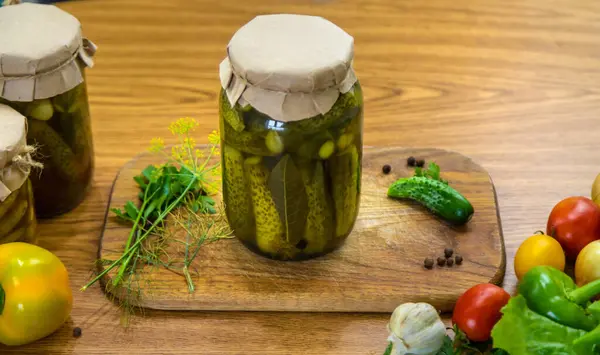 Preserving vegetables in jars in the kitchen. Selective focus. Food.