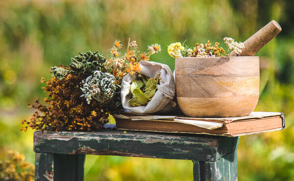 Dried medicinal herbs on the table. Selective focus. nature.