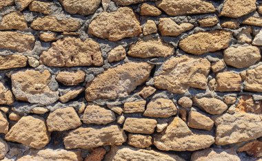 Taş duvar dokusu arka plan. Seçici odaklanma. Doğa.