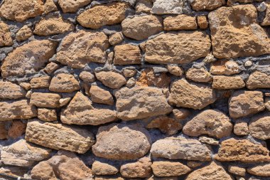 Taş duvar dokusu arka plan. Seçici odaklanma. Doğa.