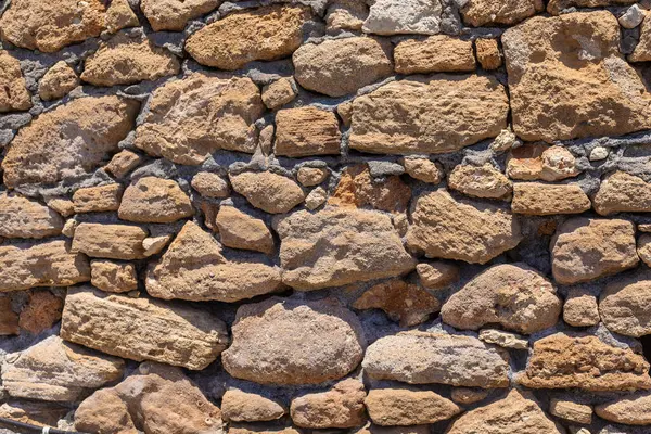 Taş duvar dokusu arka plan. Seçici odaklanma. Doğa.