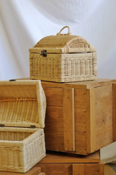 Antique chests made of woven bamboo as furnishings add to the beauty of the interior space.