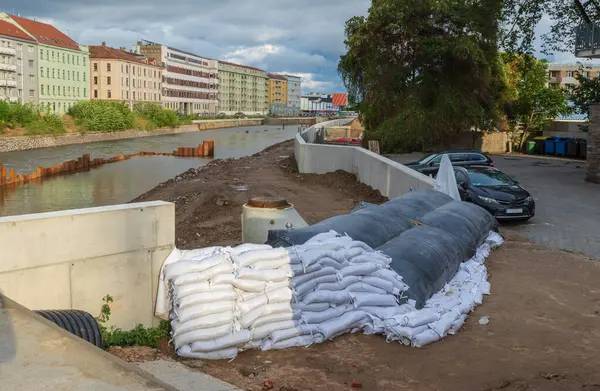 stock image Flood wall from sandbags in river basin of Svratka, Brno, Czech republic, floods after storm boris, September 15, 2024. 