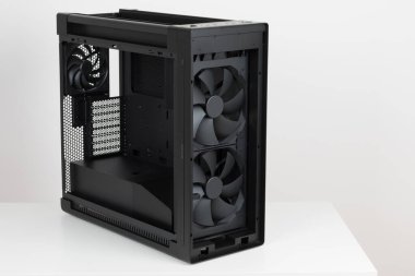 Side view of empty  big tower, PC case, chassis, two extra-thick 200 x 38 mm front fans for maximum air intake