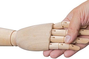 İnsan eliyle ahşap el sıkışması beyaz arka planda bir karşılama kavramıdır..