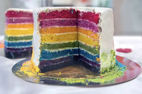 Beautiful multi-colored cake in a showcase. Food