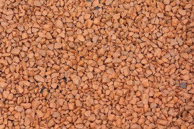 Renkli kırmızı ve kahverengi moloz yığını. Arkaplan ve doku