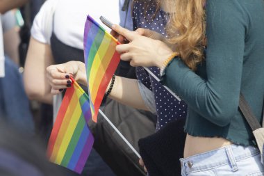 Lgbt pride rainbow flag during parade in the city