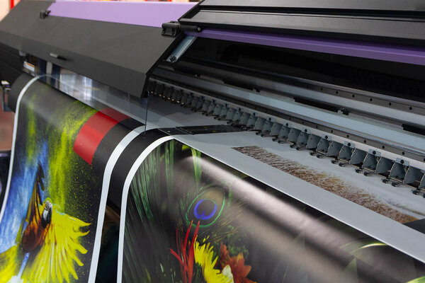 Large format printing machine in operation. Industry